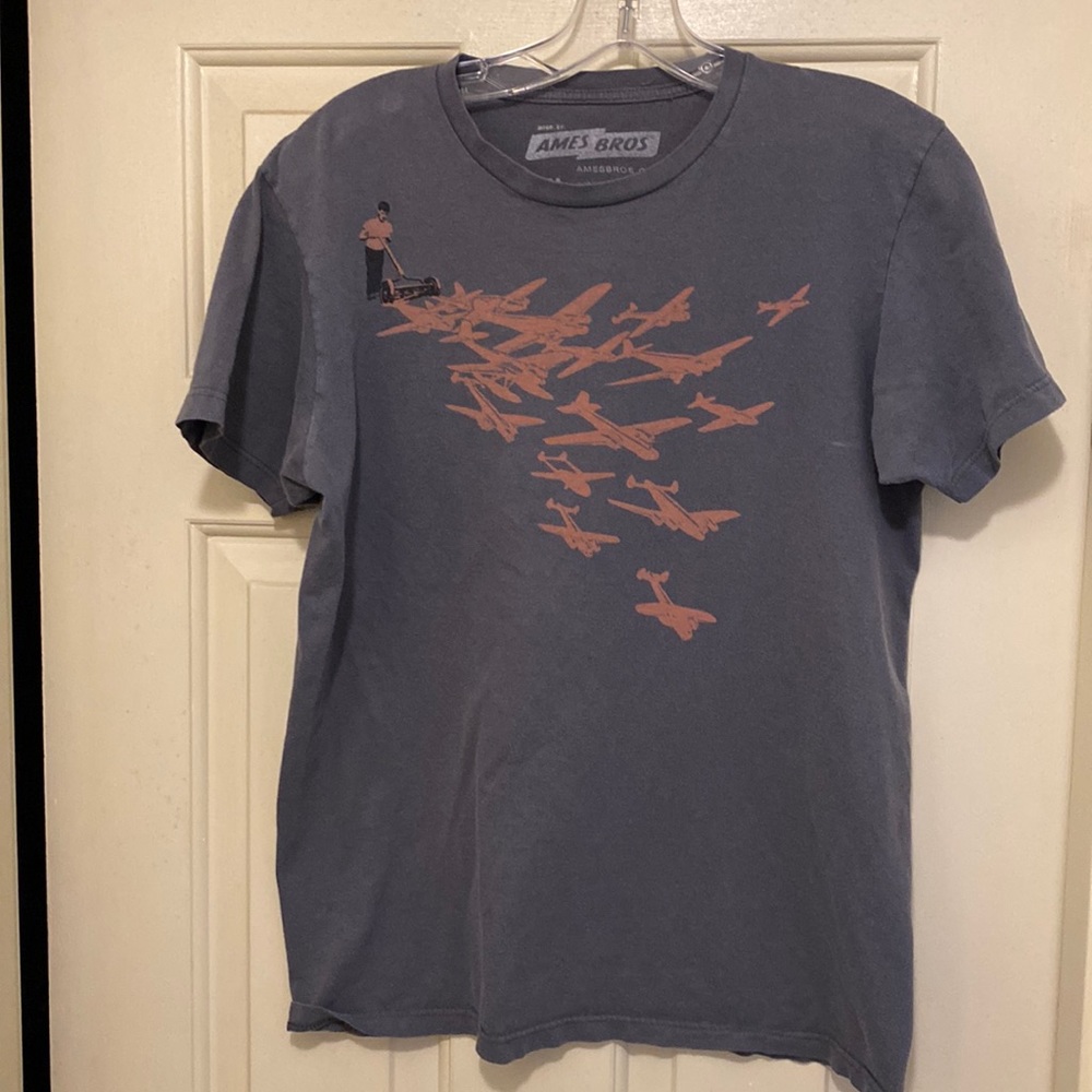 Ames Bros size M Boy mowing airplanes